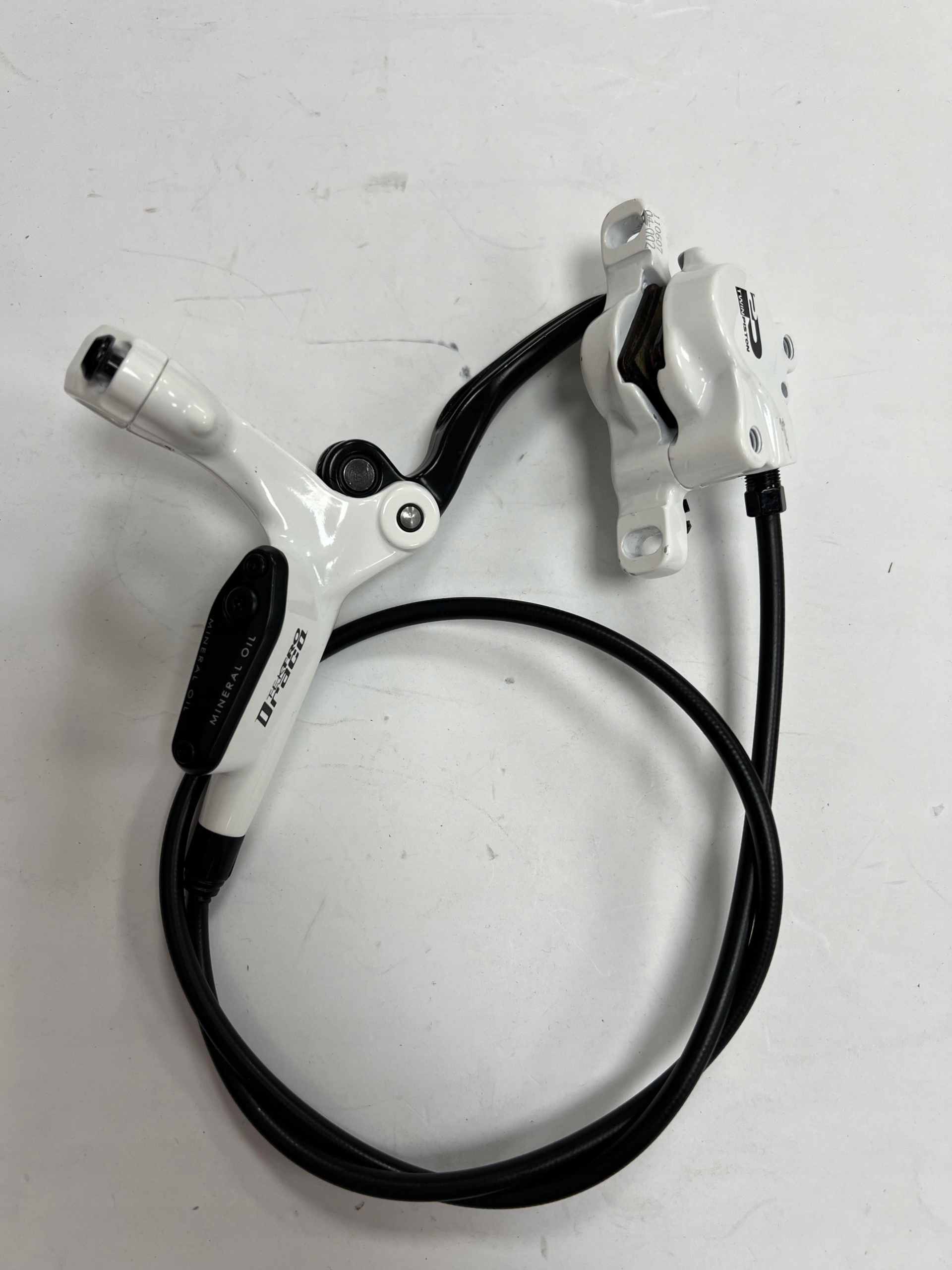 Hamulec hydrauliczny Tektro Draco Przód 91 cm, biały, 2 tłoczki - obrazek 5