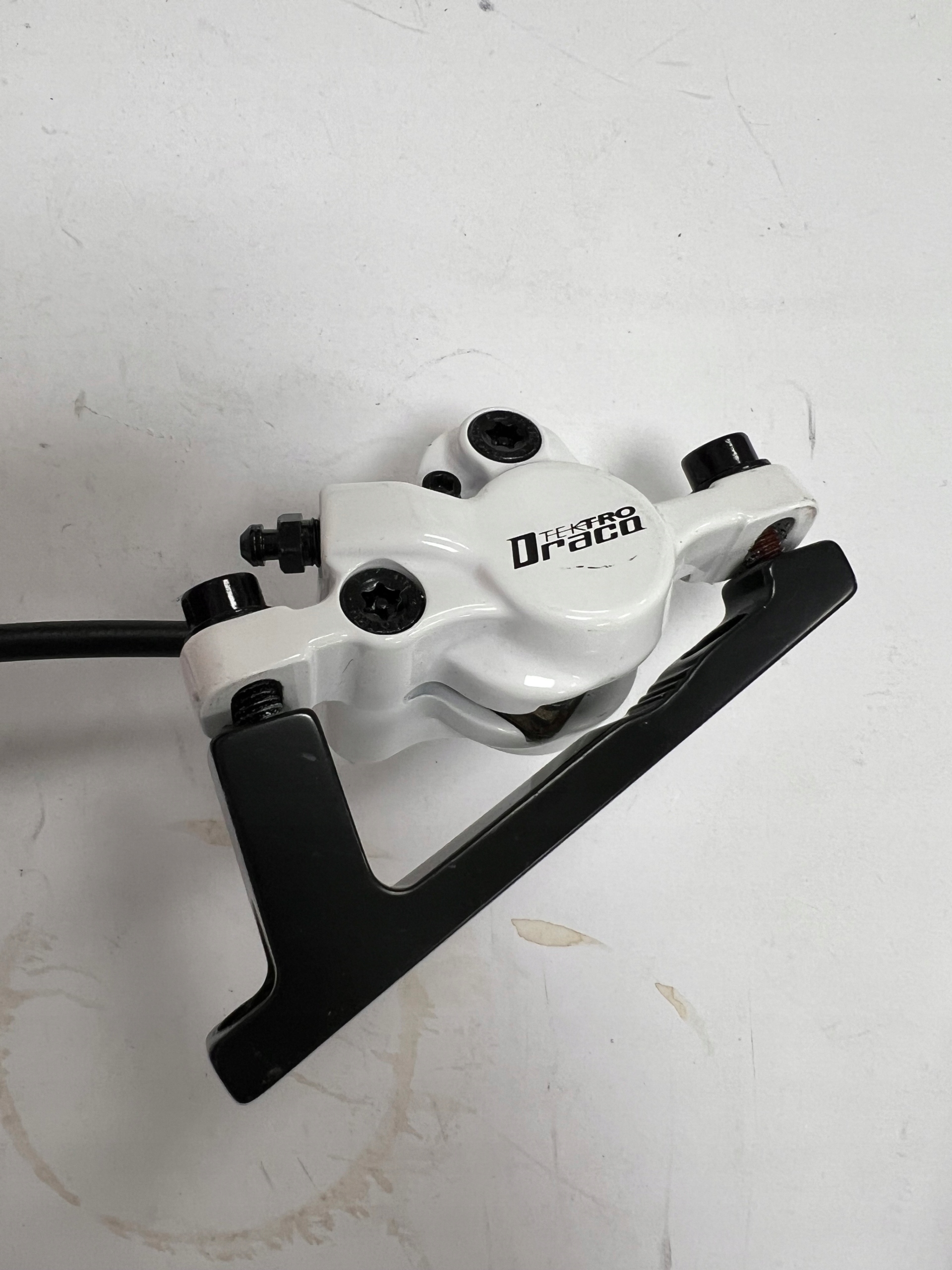 Hamulec hydrauliczny Tektro Draco Przód 72 cm, biały, 2 tłoczki + adapter - obrazek 4