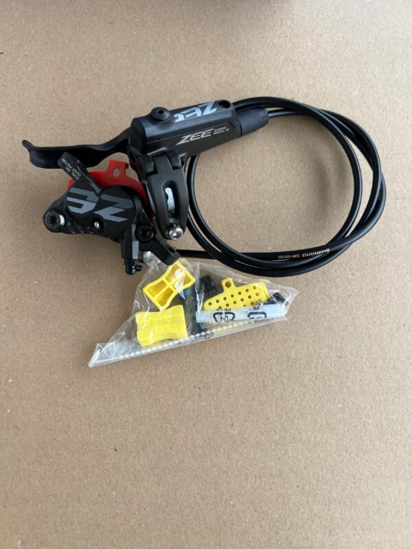 Hamulec tarczowy SHIMANO ZEE BR-M640/BL-M640 4 tłoczki przód 1000 mm - obrazek 3