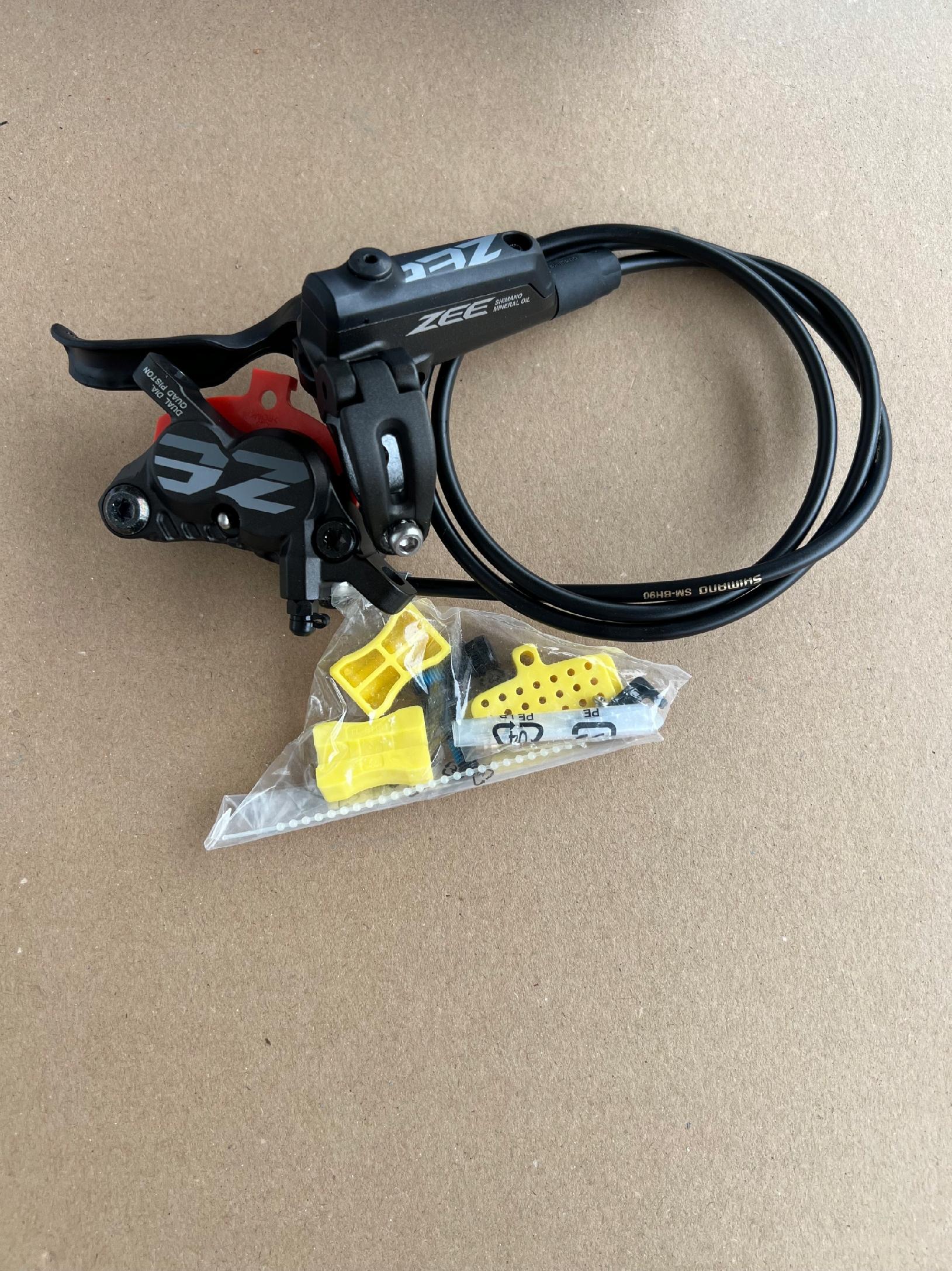 Hamulec tarczowy SHIMANO ZEE BR-M640/BL-M640 4 tłoczki przód 1000 mm - obrazek 3